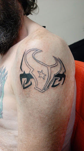 Explore batman sleeve tattoo ideas, creative tattoo ideas in Onalaska, available at Divine Designs tattoo studio