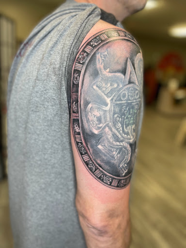Explore tattoo cover up ideas for upper back, creative tattoo ideas in Watford City, available at Soulful Ink Studios