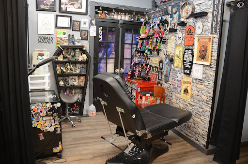 Explore back neck tattoo ideas, creative tattoo ideas in Platteville, available at Ye Old Tattoo Shoppe, llc