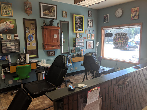 Find sword tattoo ideas for your next unique tattoo in Storm Lake at Alley Cat Tattoo