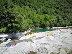 Photo de Plage de Coston avec un niveau de propreté de assez propre