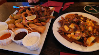 Poutine du Restaurant The Canadian Embassy Pub à Paris - n°9