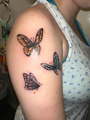 Explore women's spine tattoo ideas, creative tattoo ideas in Oklahoma City, available at Oklahoma Tattoo Collective