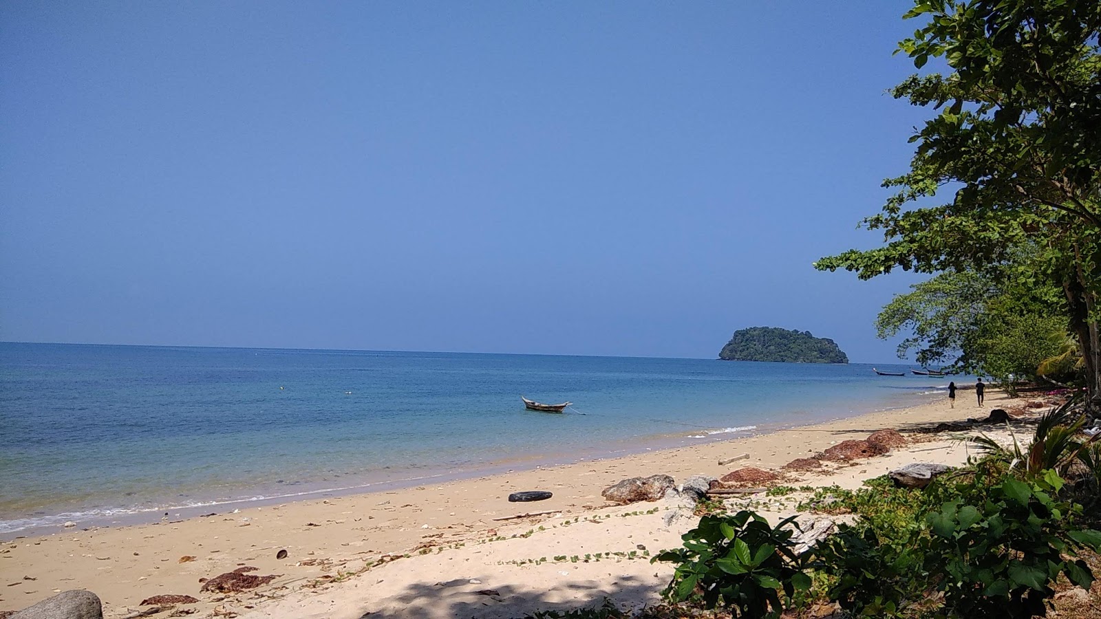 Photo of LangKhao Beach with bright sand & rocks surface