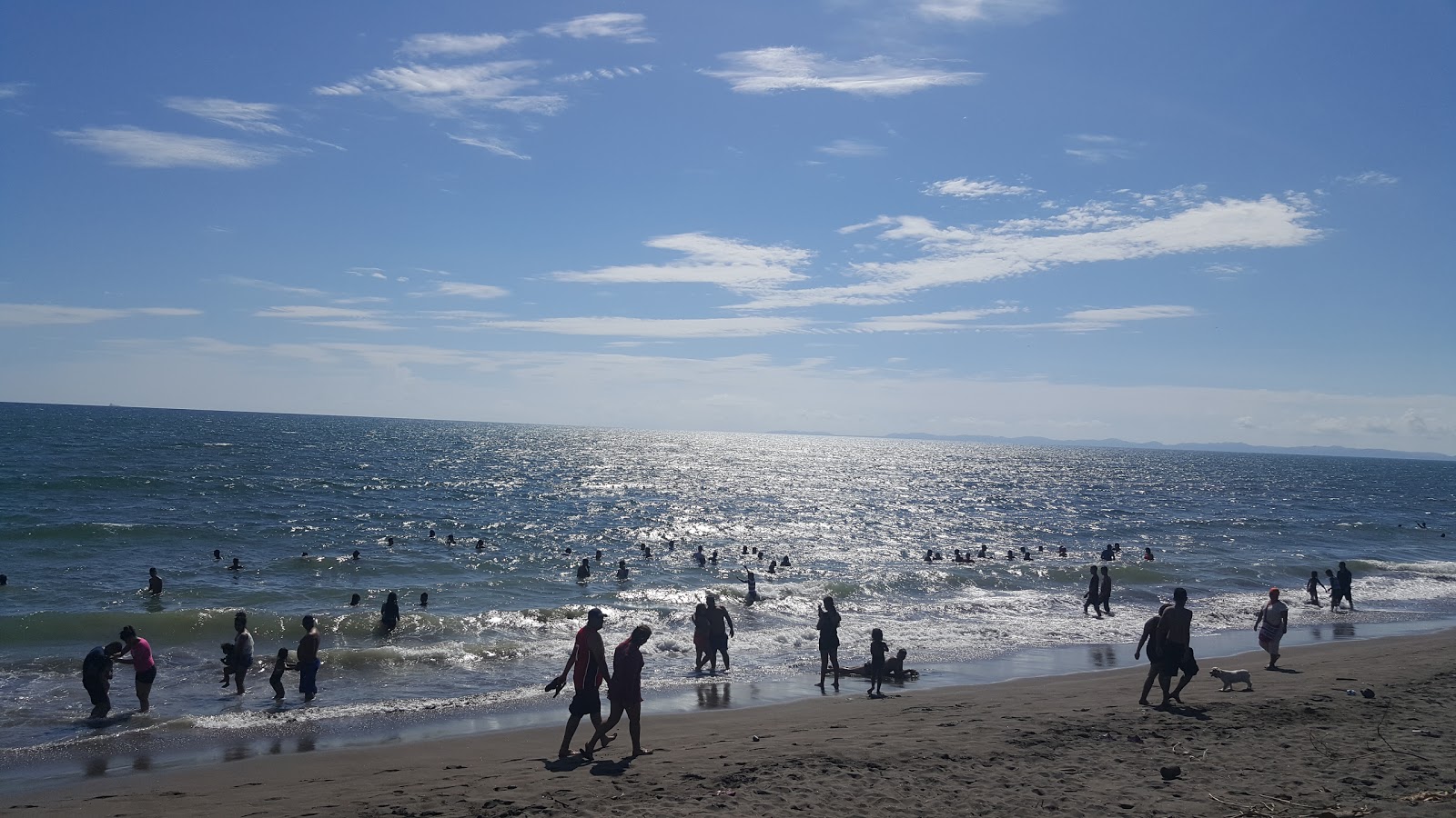 Foto av Playa de Estero Rico med lång rak strand
