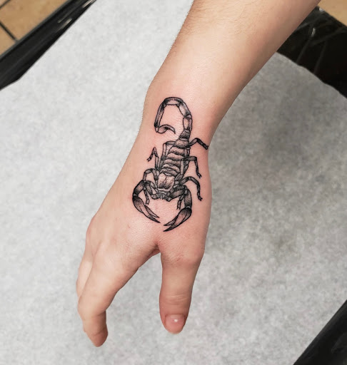 Explore small initial tattoo ideas, creative tattoo ideas in Tampa, available at Angel Tattoo