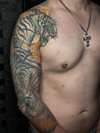 Find dragon tattoo ideas for men for your next unique tattoo in Brooklyn at Nine Dragons Tattoo
