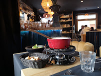 Plats et boissons du Restaurant de fondues L'Atelier Marcel - fondue à Megève - n°1