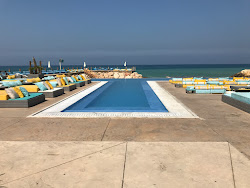 Foto von Iris Beach Club und die siedlung