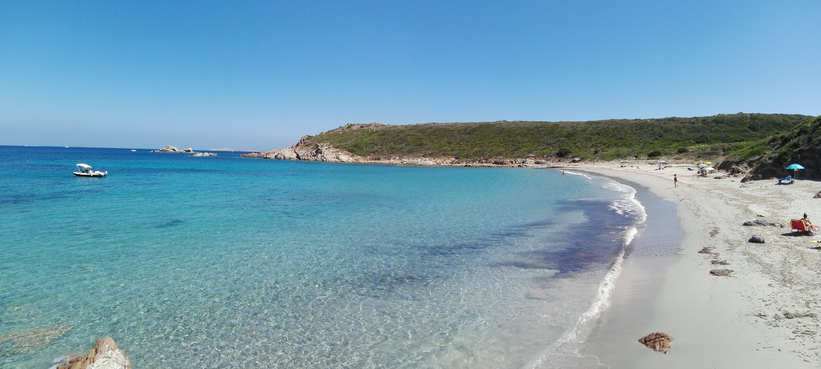 Foto von Spiaggia La Balcaccia mit beiger sand Oberfläche