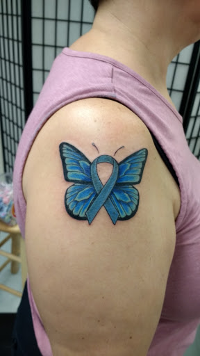 Explore back tattoo ideas for guys, creative tattoo ideas in Middlebury, available at Frog Alley Tattoo & Leatherworks