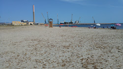 Portoscuso Beach'in fotoğrafı geniş bir kıyı şeridi ile birlikte