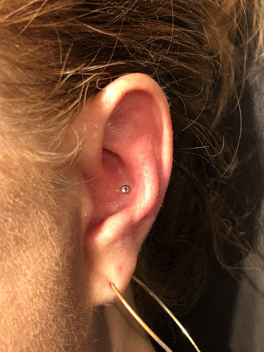 Explore floral arm tattoo ideas, creative tattoo ideas in Springfield, available at Kaleidoscope