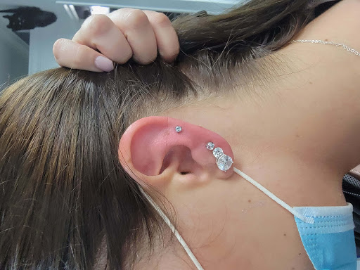 Explore tattoos behind ear ideas, creative tattoo ideas in Sarasota, available at Z-Edge Tattoo and Body Piercing North Shop