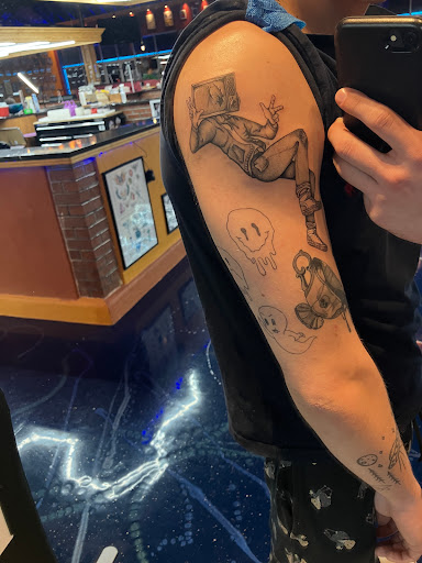 Explore honeysuckle tattoo ideas, creative tattoo ideas in Virginia Beach, available at Blue Horseshoe Tattoo & Piercing