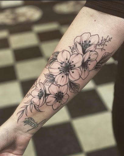 Explore cute cow tattoo ideas, creative tattoo ideas in Stevens Point, available at Black Rabbit Tattooing