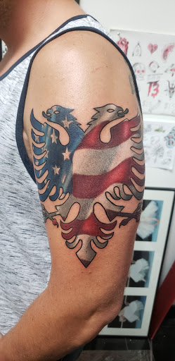 Explore hidden name tattoo ideas, creative tattoo ideas in Lagrangeville, available at Black Cherry Tattoo Studio NY