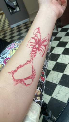 Explore pink tattoo ideas, creative tattoo ideas in Vidalia, available at Freedom Ink Tattoo
