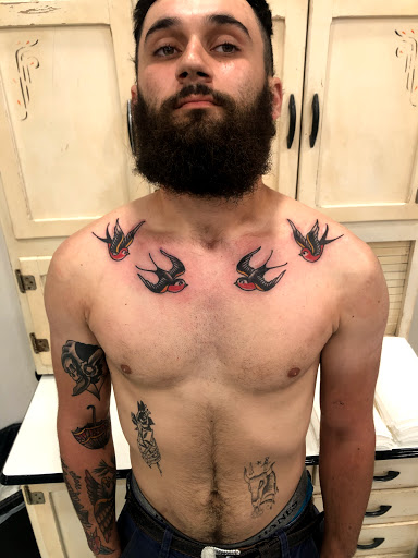 Find gothic tattoo ideas for women for your next unique tattoo in Youngsville at Bad Fun Company