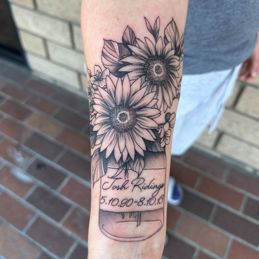 Explore dog tag tattoo ideas, creative tattoo ideas in Los Alamitos, available at Mr. Inkwells Classy Tattoos