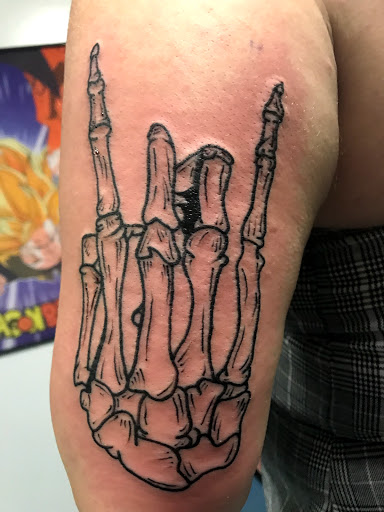 Explore wedding ring finger tattoo ideas, creative tattoo ideas in Muncie, available at The Tattoo Studio