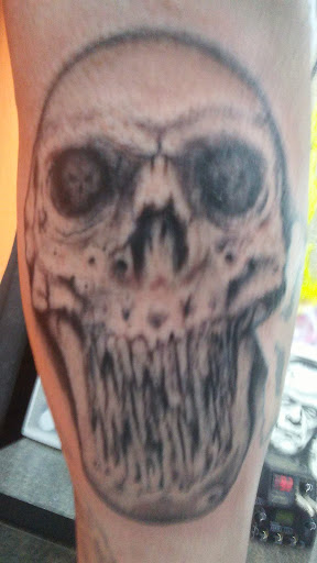 Tattoo Shop «Shrunkin Head Tattoo», reviews and photos, 4438 St John Ave, Kansas City, MO 64123, USA