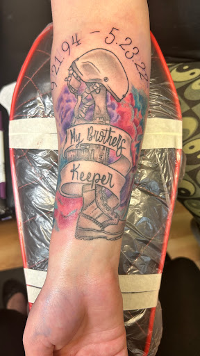 Explore skydive tattoo ideas, creative tattoo ideas in Cedar Falls, available at Tales Untold Tattoos