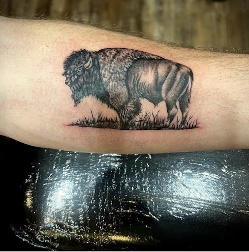 Find best friend tattoo ideas for guys for your next unique tattoo in Hudson at St. Croix Ink Tattoo