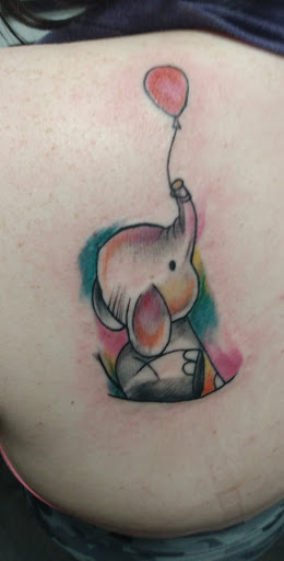 Explore torn skin tattoo ideas, creative tattoo ideas in Pigeon Forge, available at Black Orchid Tattoo Studio