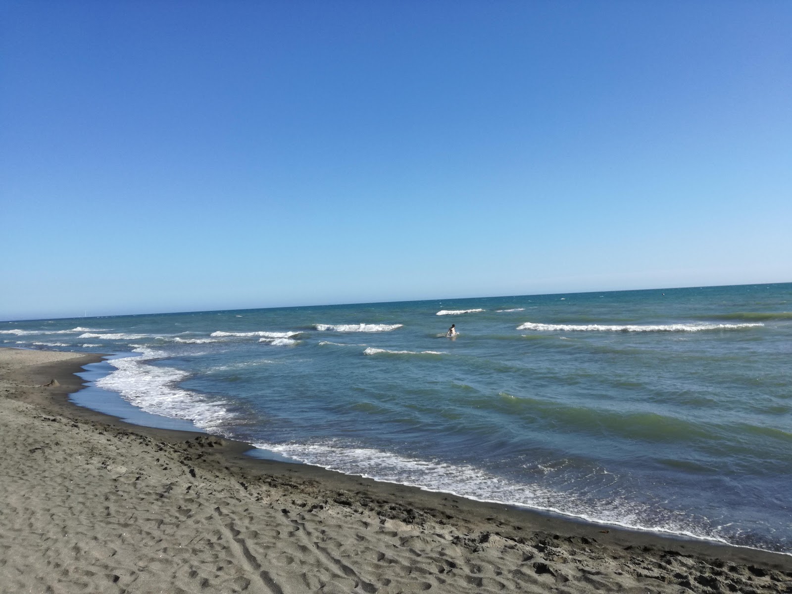 Fotografie cu Montalto Marina beach II cu drept și lung