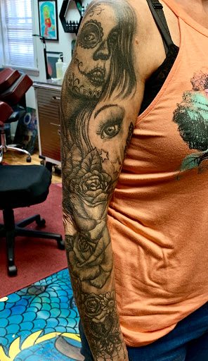 Explore dragon head tattoo ideas, creative tattoo ideas in Peoria, available at Big Top Tat2