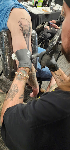 Explore eagle feather tattoo ideas, creative tattoo ideas in Harrah, available at Gypsy Blood Body Art Studio