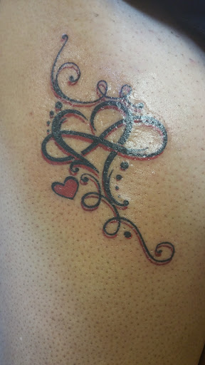 Tattoo Shop «The Iron Inkwell Custom Tattoos & Piercings», reviews and photos, 1901 N Monroe St Suite D, Tallahassee, FL 32303, USA