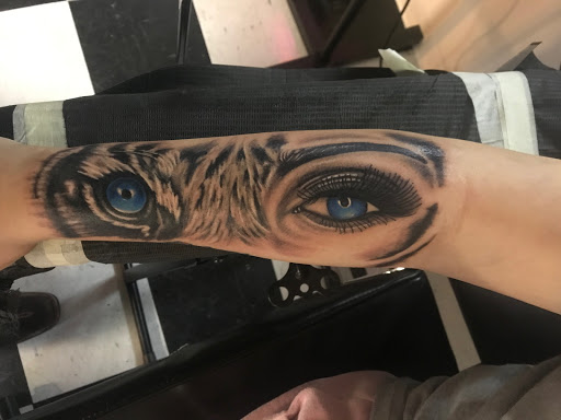 Explore covering up name tattoos ideas, creative tattoo ideas in Evans Mills, available at Undeniable Ink