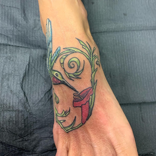 Find tattoo ideas of trees for your next unique tattoo in Hudson Falls at ALTERED ADDICTION TATTOOS