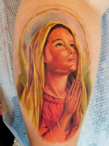 Explore snake tattoo idea, creative tattoo ideas in Dayton, available at Blue Byrd Tattoo