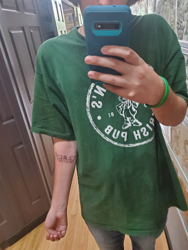 Explore flower tattoo cover up ideas, creative tattoo ideas in Grand Rapids, available at Brenda Sues Tattoos