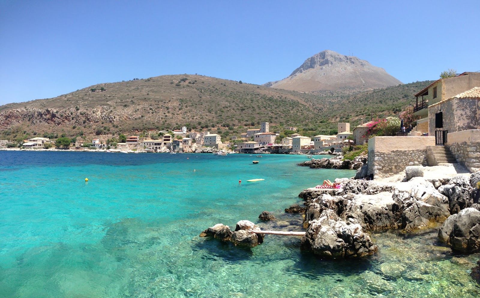 Foto von Dexameni Beach mit betonierte fläche Oberfläche