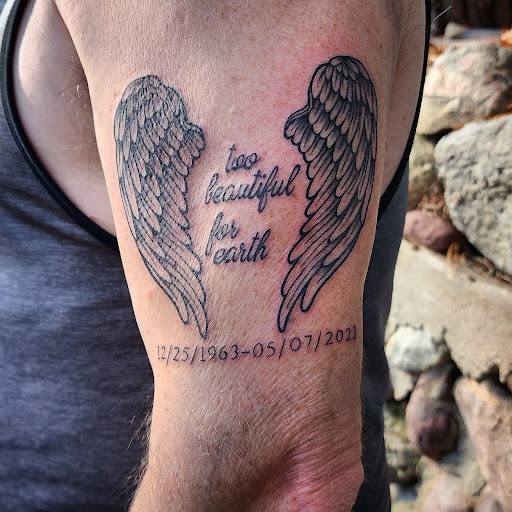 Explore tattoo ideas for dad, creative tattoo ideas in Minocqua, available at Whisky Rose Tattoo Parlor