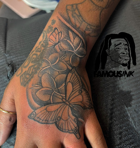 Explore unique tramp stamp tattoo ideas, creative tattoo ideas in Hammond, available at Famous Ink, Inc.