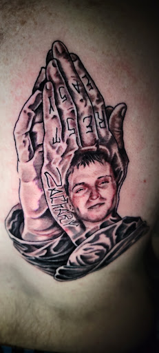 Find tattoos under the breast ideas for your next unique tattoo in Angola at Hoodlum Ink