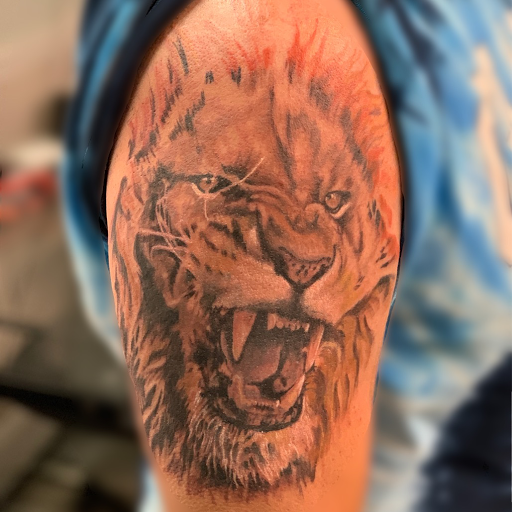 Explore neck tattoo ideas for women, creative tattoo ideas in Ocala, available at The Tattoo Gallery of Ocala LLC