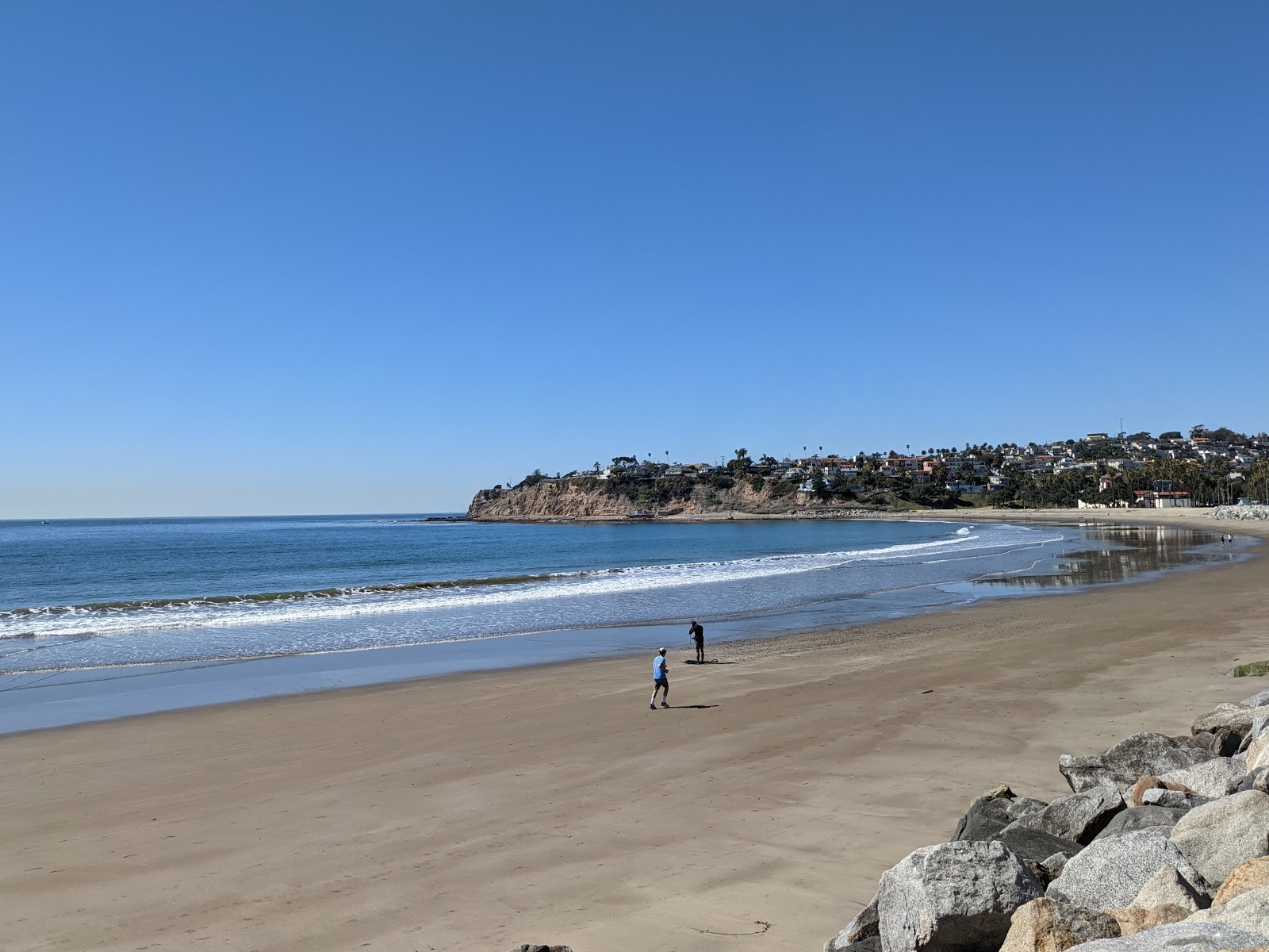 Photo of Cabrillo Beach with bright sand surface