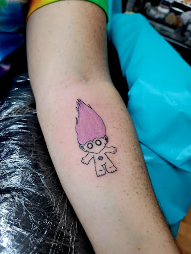 Explore practical magic tattoo ideas, creative tattoo ideas in Benton, available at Spectrum Tattoo