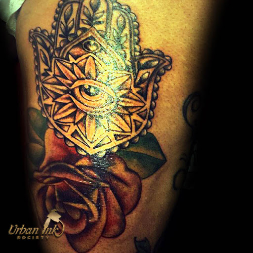 Explore chest tattoo ideas for females, creative tattoo ideas in Raleigh, available at Urban Ink society