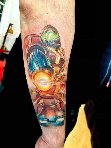 Explore ripped skin tattoo ideas, creative tattoo ideas in Houston, available at Los Muertos Tattoo Studio and Art Gallery