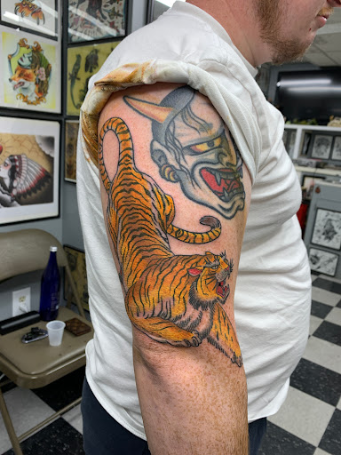 Explore american flag tattoos ideas, creative tattoo ideas in Cranston, available at TomButts Tattoo LLC