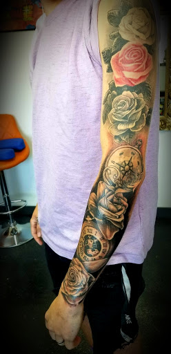 Explore memorial tattoo sleeve ideas, creative tattoo ideas in Nevada, available at Generation X Tattoos and Piercings