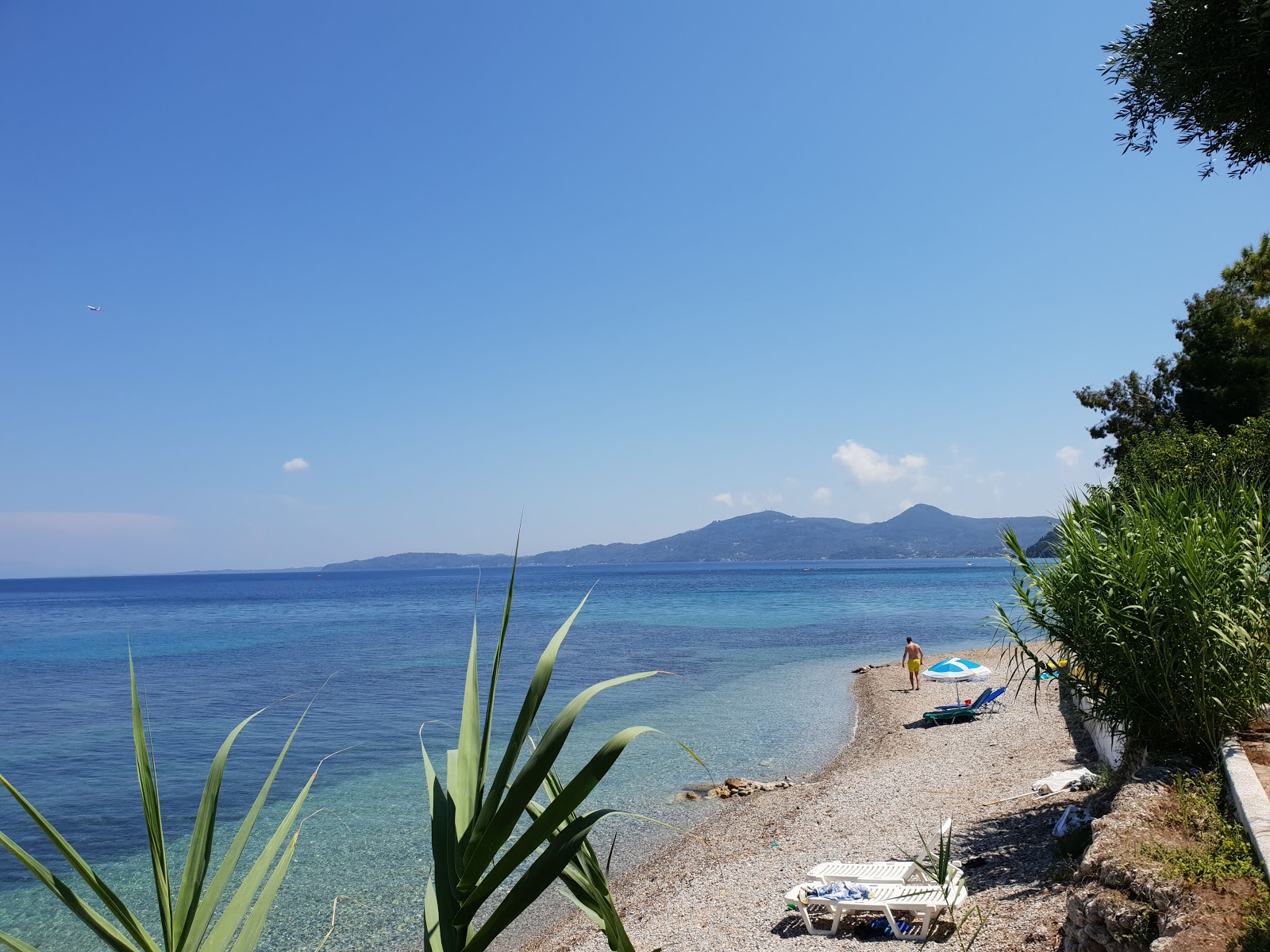 Foto af Corfu Senses Strand med grå fin sten overflade