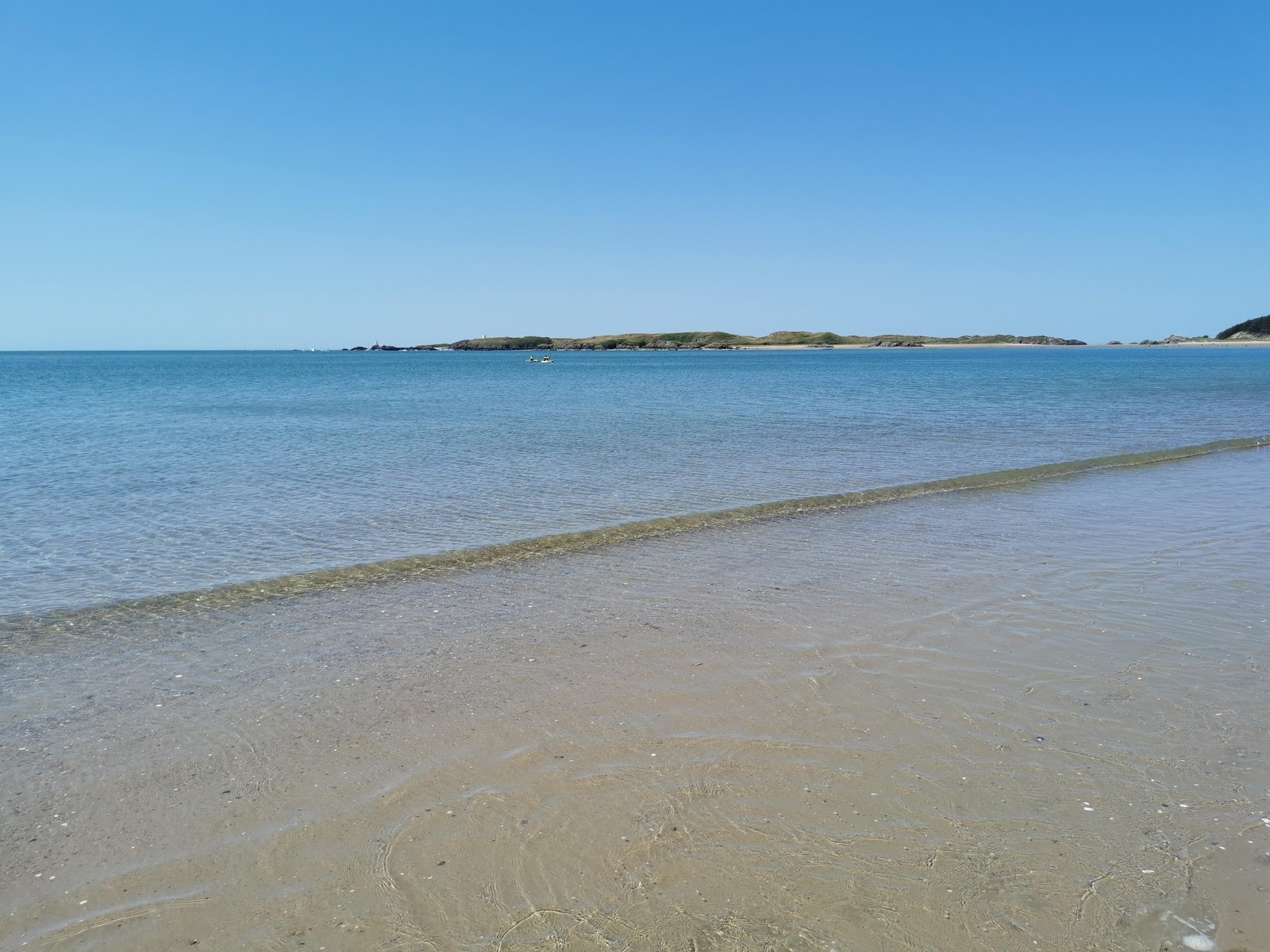 Fotografie cu Plaja Newborough - locul popular printre cunoscătorii de relaxare